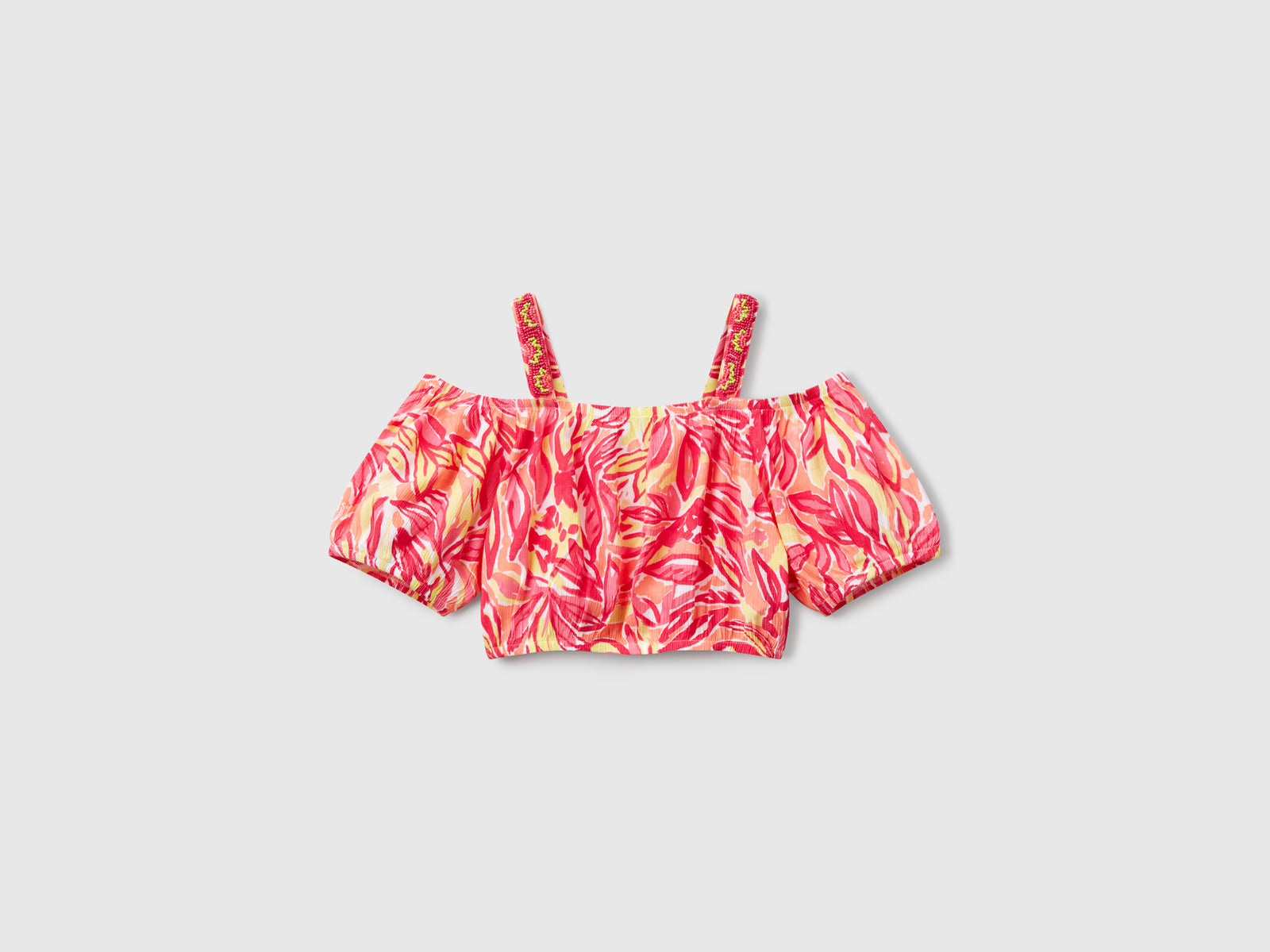 Crop top con stampa tropicale da bambina multi-color | Benetton Outlet