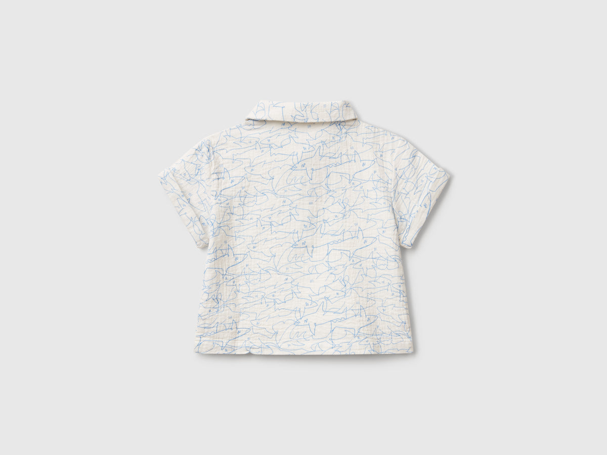 Polo con stampa squali