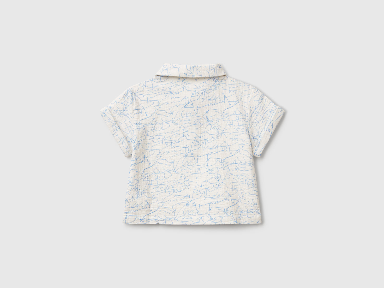 Polo con stampa squali da neonato bianco panna 2 | Benetton Outlet