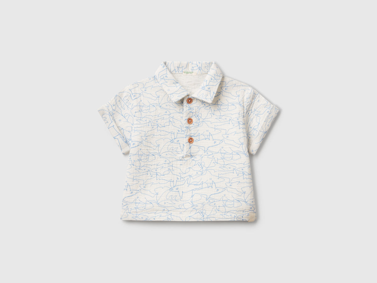 Polo con stampa squali