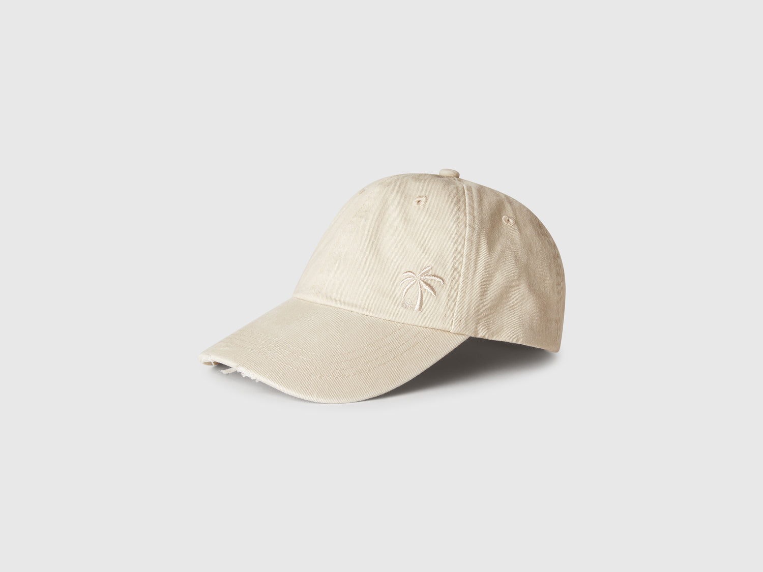 Cappello baseball con ricamo da bambino bianco panna | Benetton Outlet