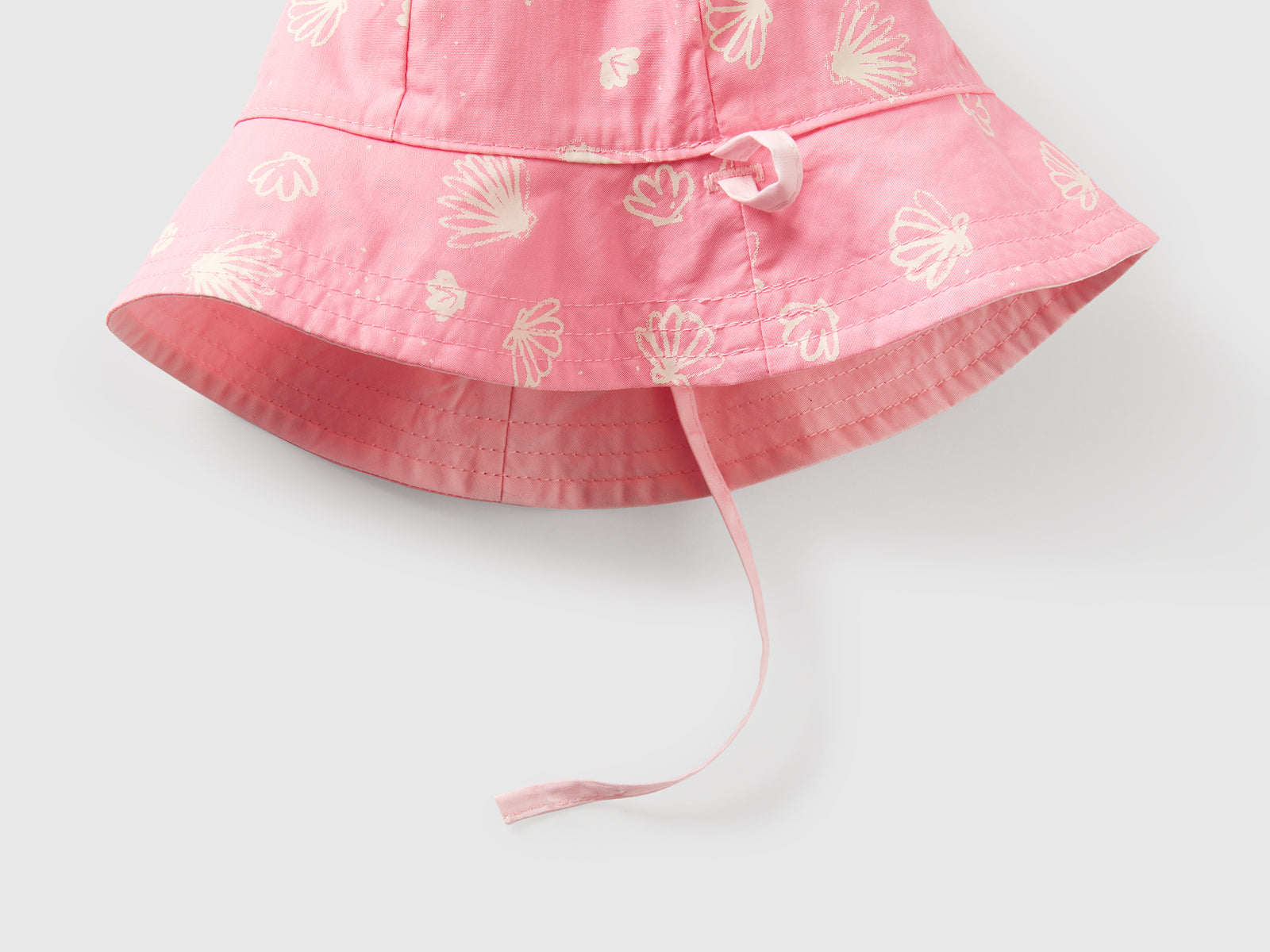 Cappello reversibile con stampa mare da neonato rosa 3 | Benetton Outlet