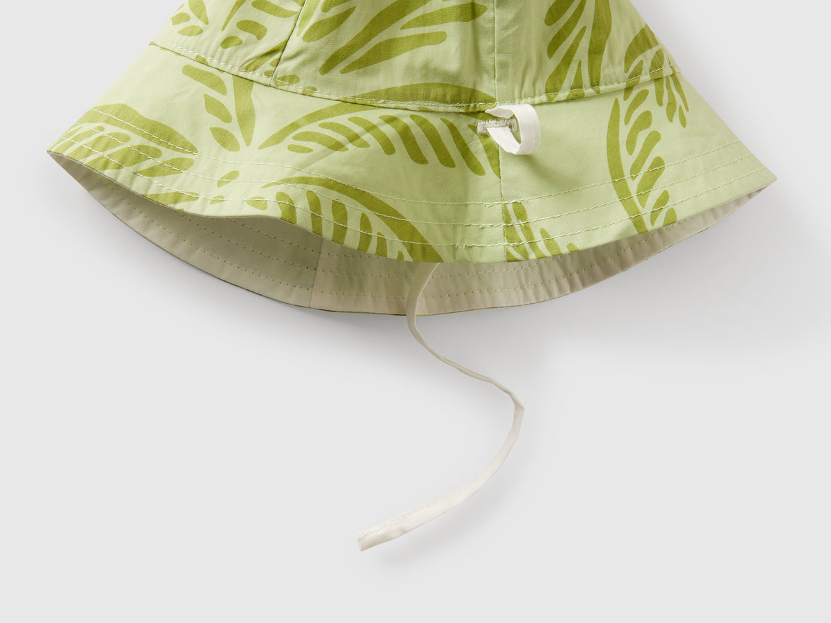 Cappello reversibile con stampa tropicale