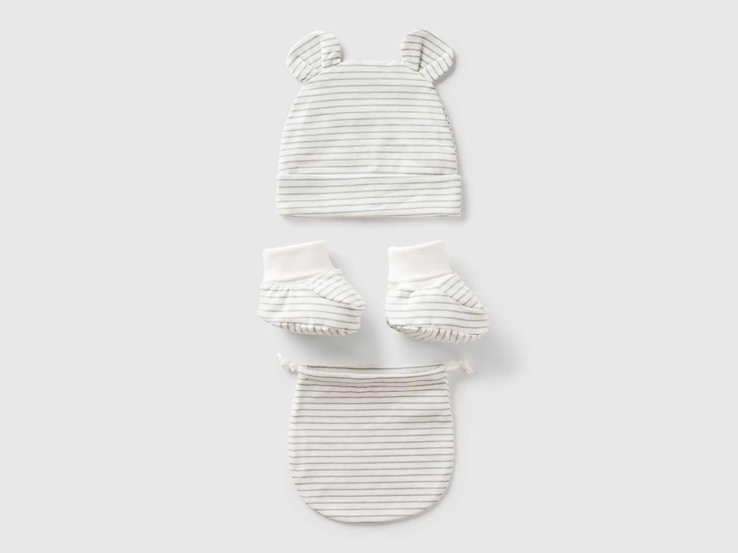 Berretto e babbucce a righe da neonato bianco | Benetton Outlet