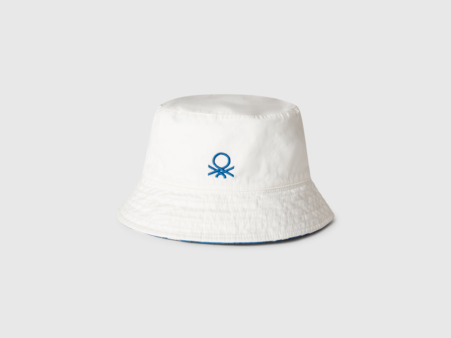 Cappello reversibile stile pescatore da bambino blu | Benetton Outlet