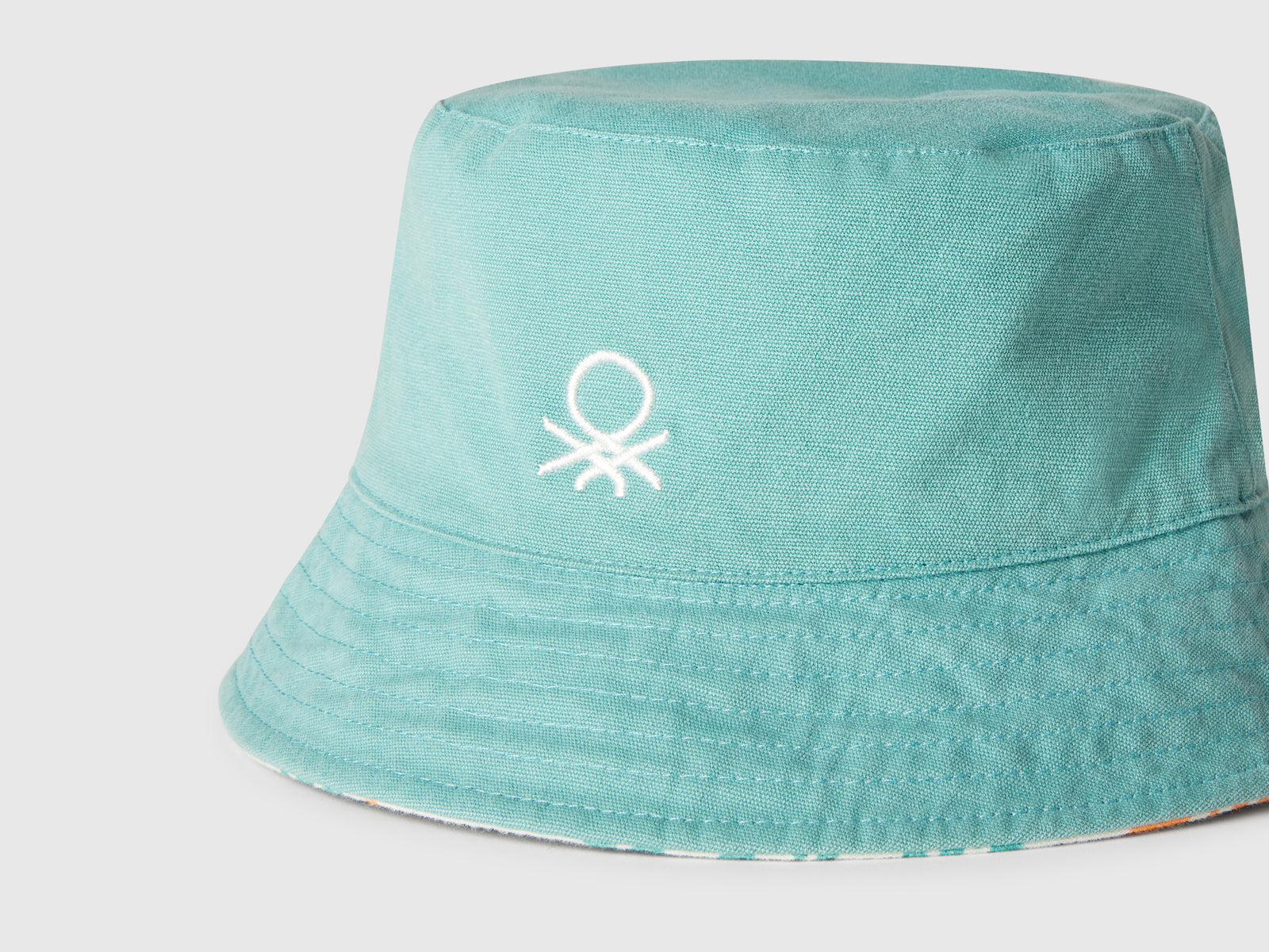 Cappello reversibile stile pescatore da bambino verde acqua 3 | Benetton Outlet