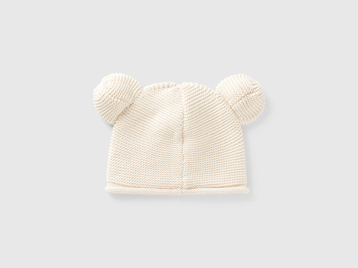 Cappellino tricot con applicazioni