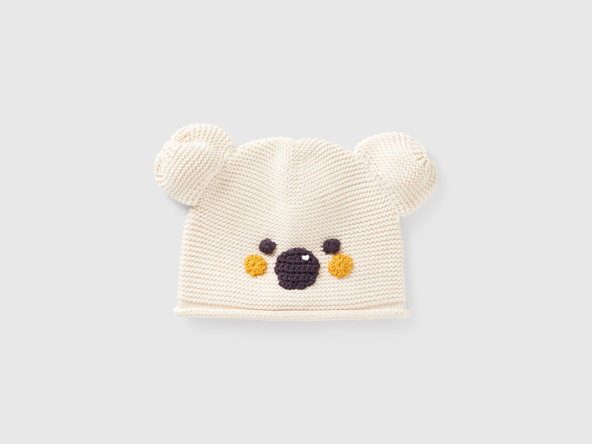 Cappellino tricot con applicazioni