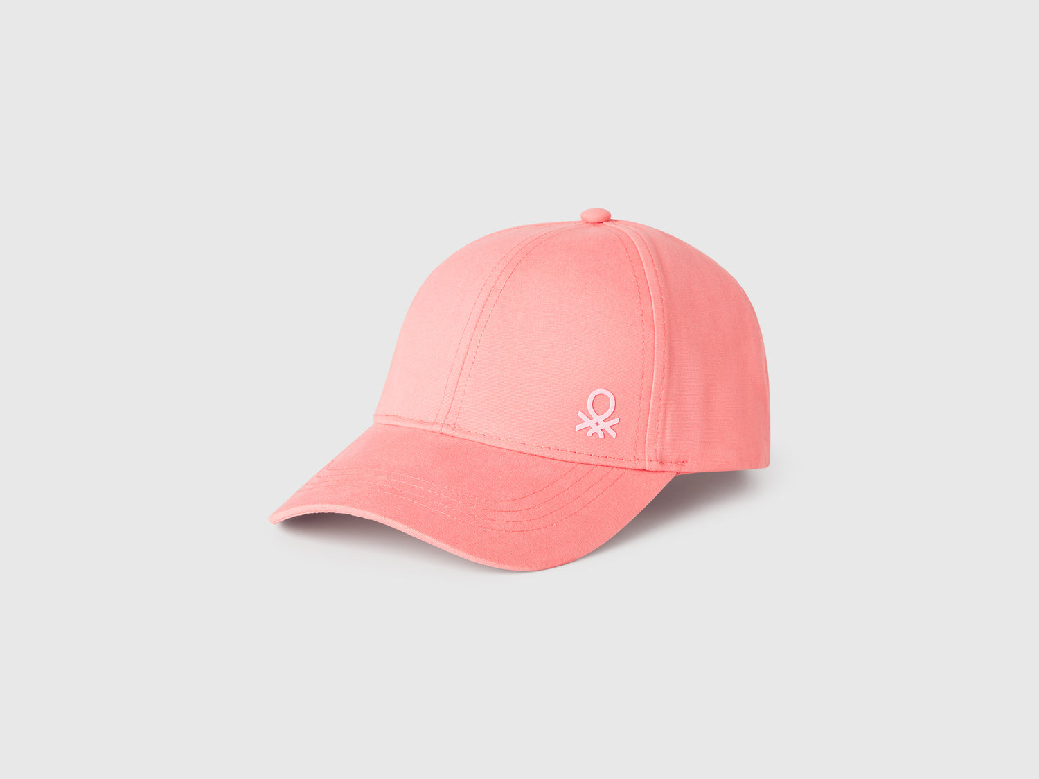 Cappellino con visiera da bambino rosa | Benetton Outlet
