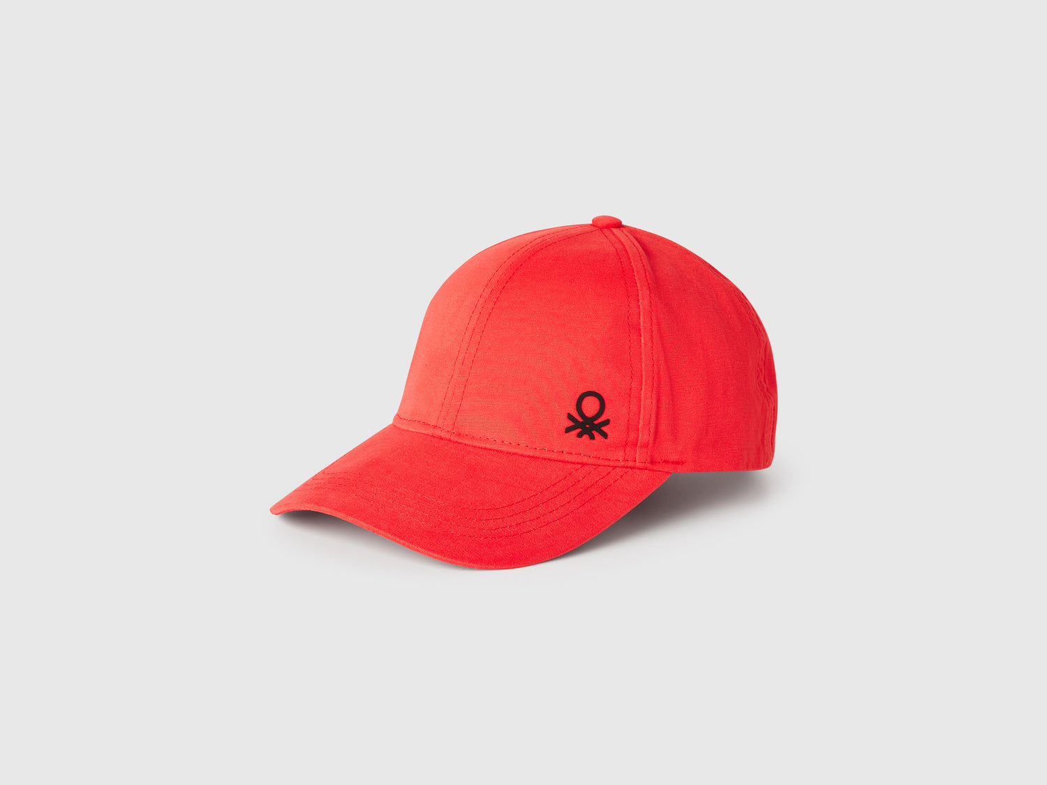 Cappellino con visiera da bambino rosso | Benetton Outlet