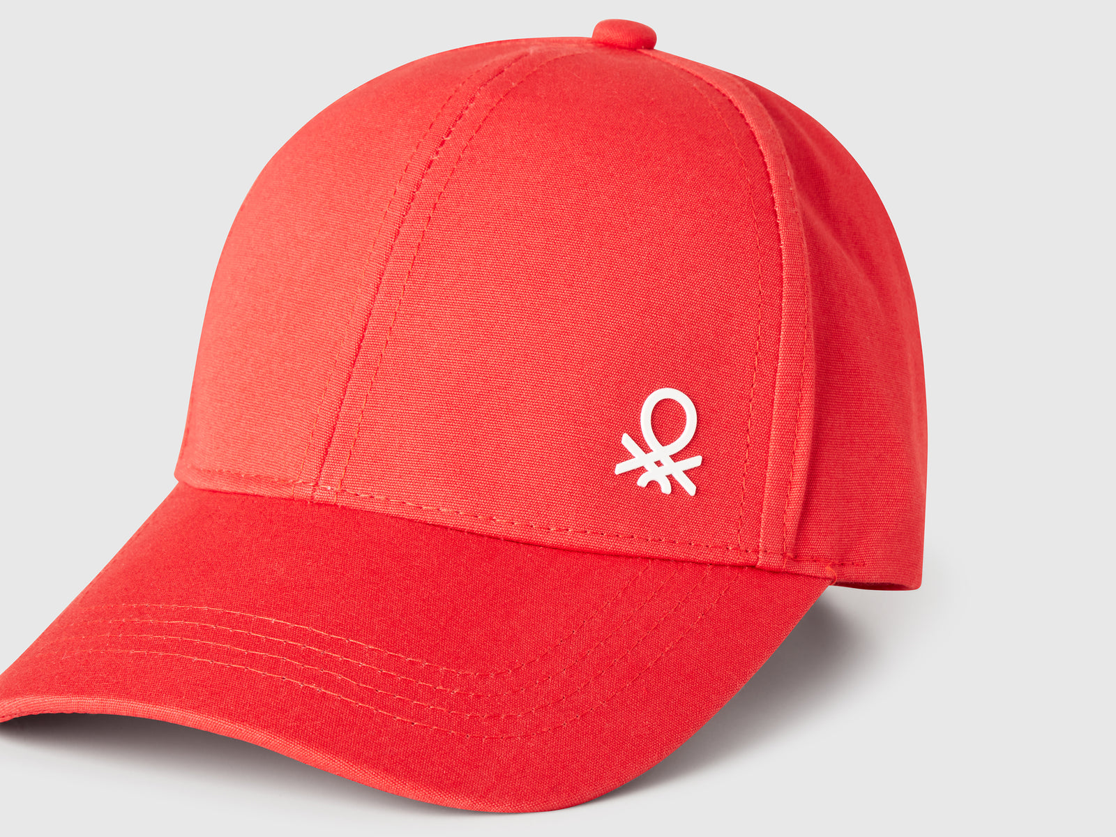 Cappellino in cotone con logo da bimbo rosso 3 | Benetton Outlet