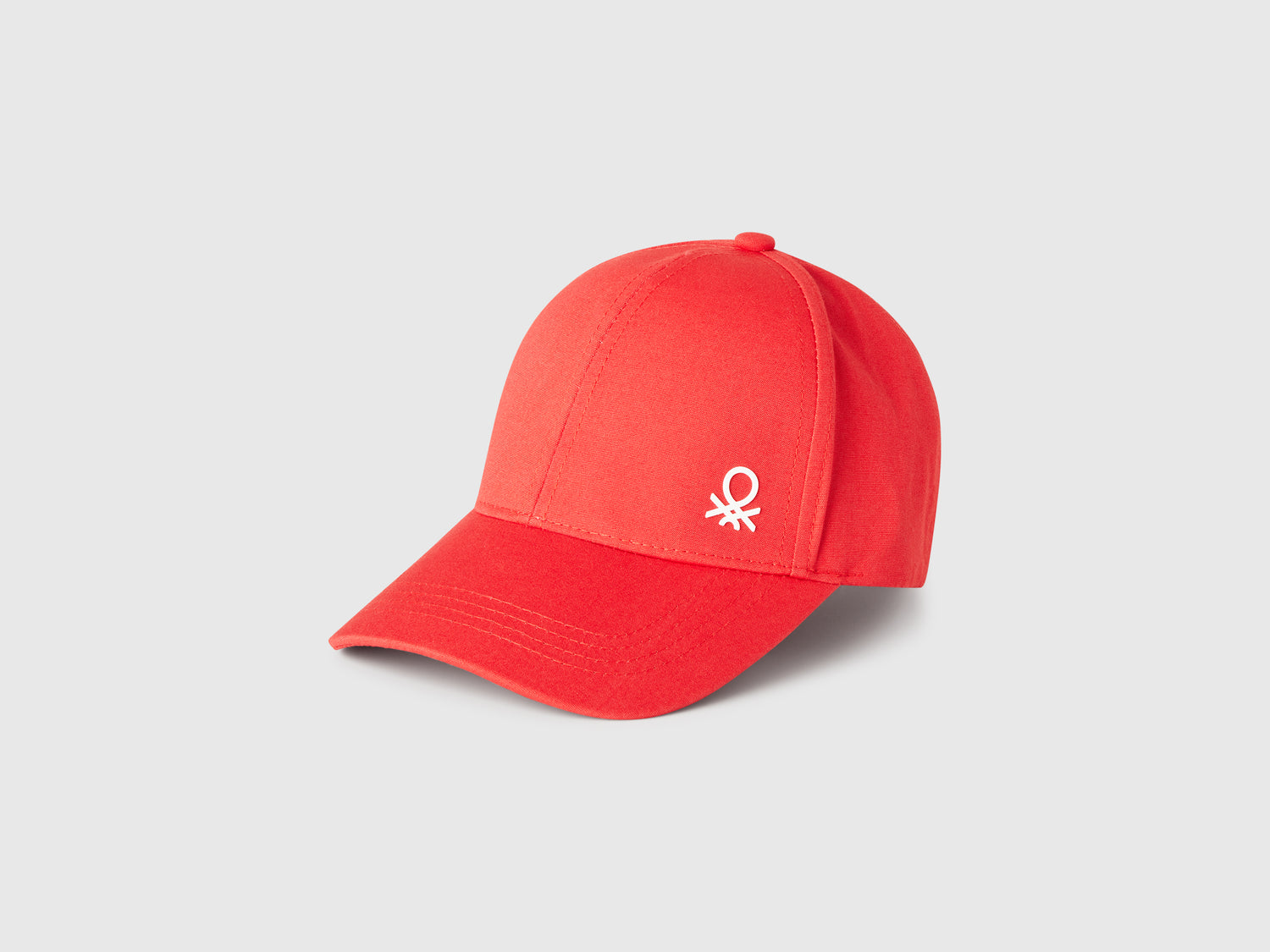 Cappellino in cotone con logo da bimbo rosso | Benetton Outlet