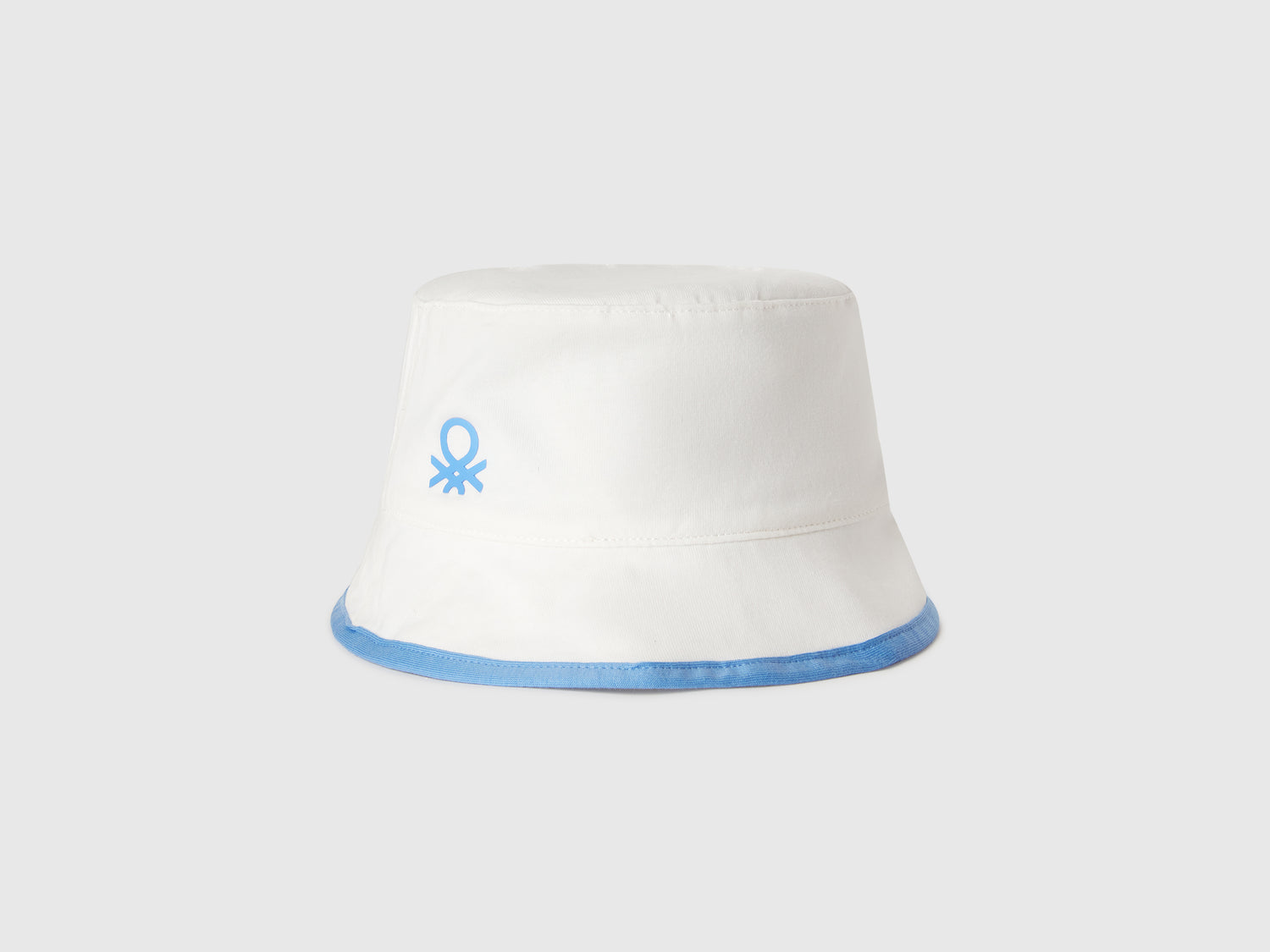 Cappello reversibile con stampa mare da bimbo bianco | Benetton Outlet
