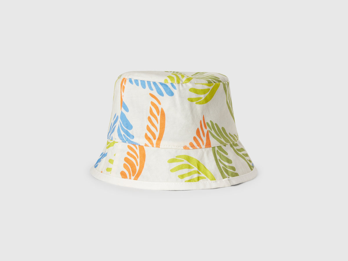 Cappello reversibile con stampa tropicale