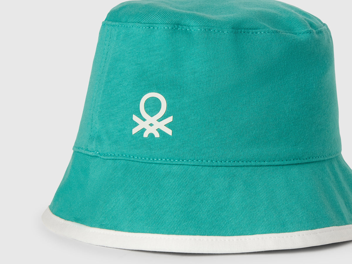 Cappello reversibile con stampa tropicale