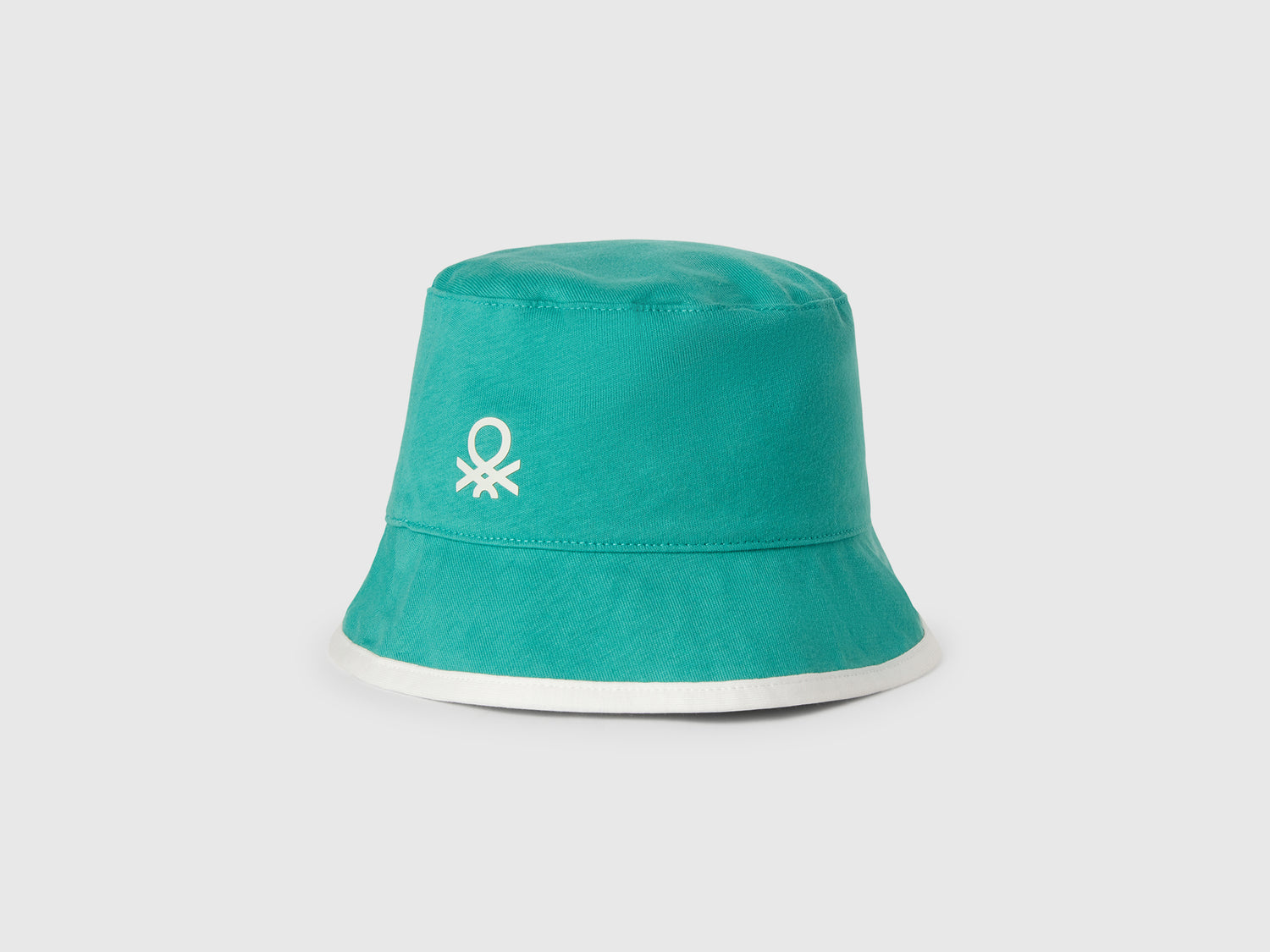 Cappello reversibile con stampa tropicale da bimbo verde acqua | Benetton Outlet