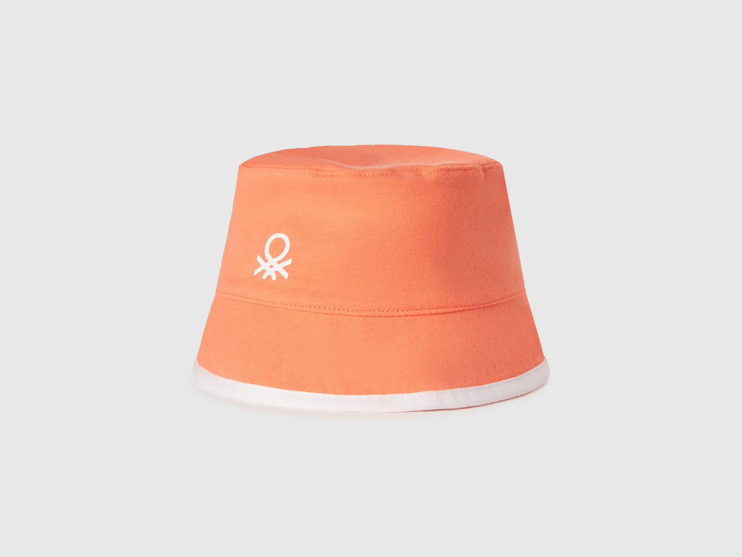Cappello reversibile con stampa floreale da bimbo arancione | Benetton Outlet
