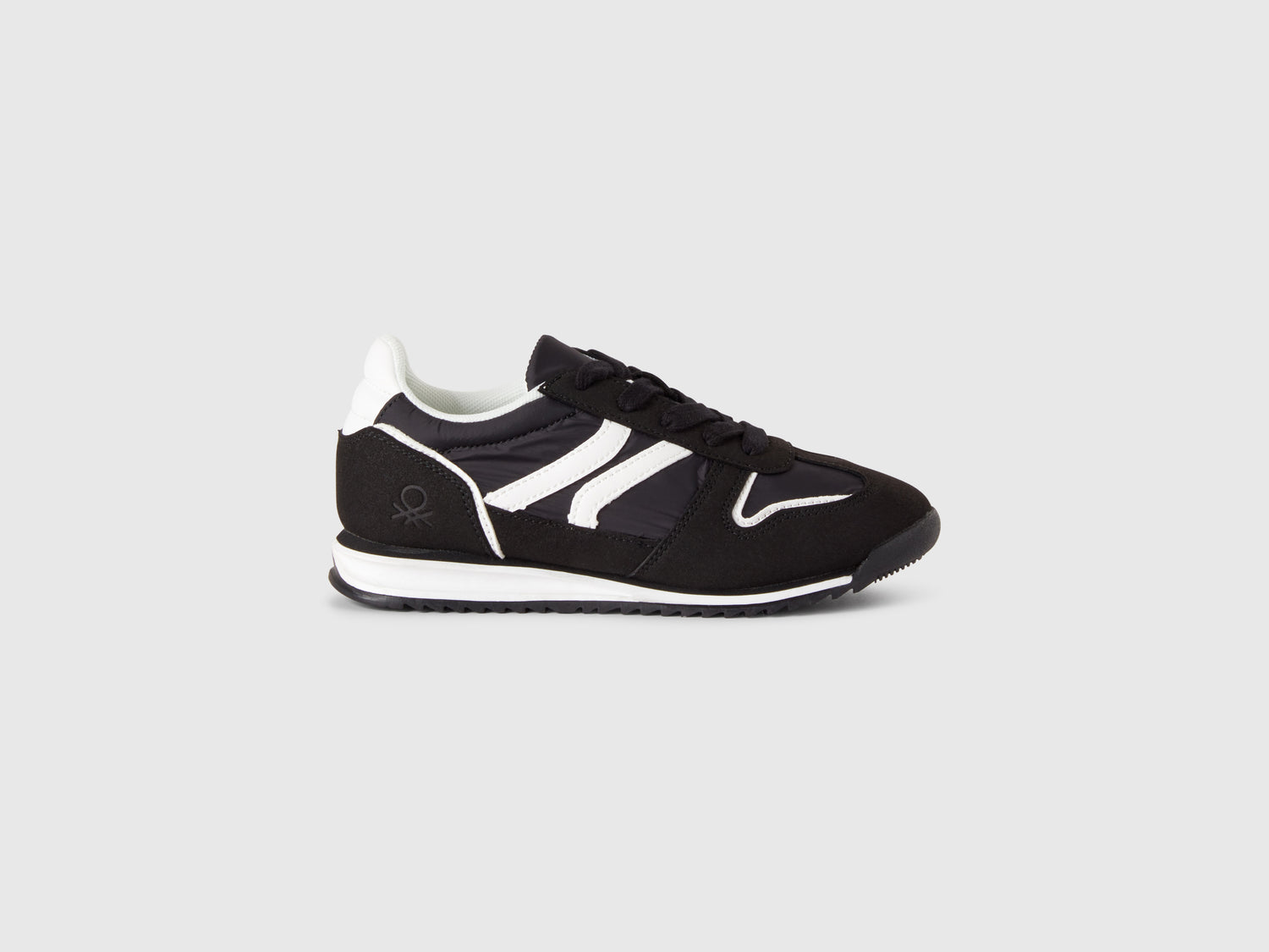 Sneakers in nylon e tessuto scamosciato da bambino nero | Benetton Outlet