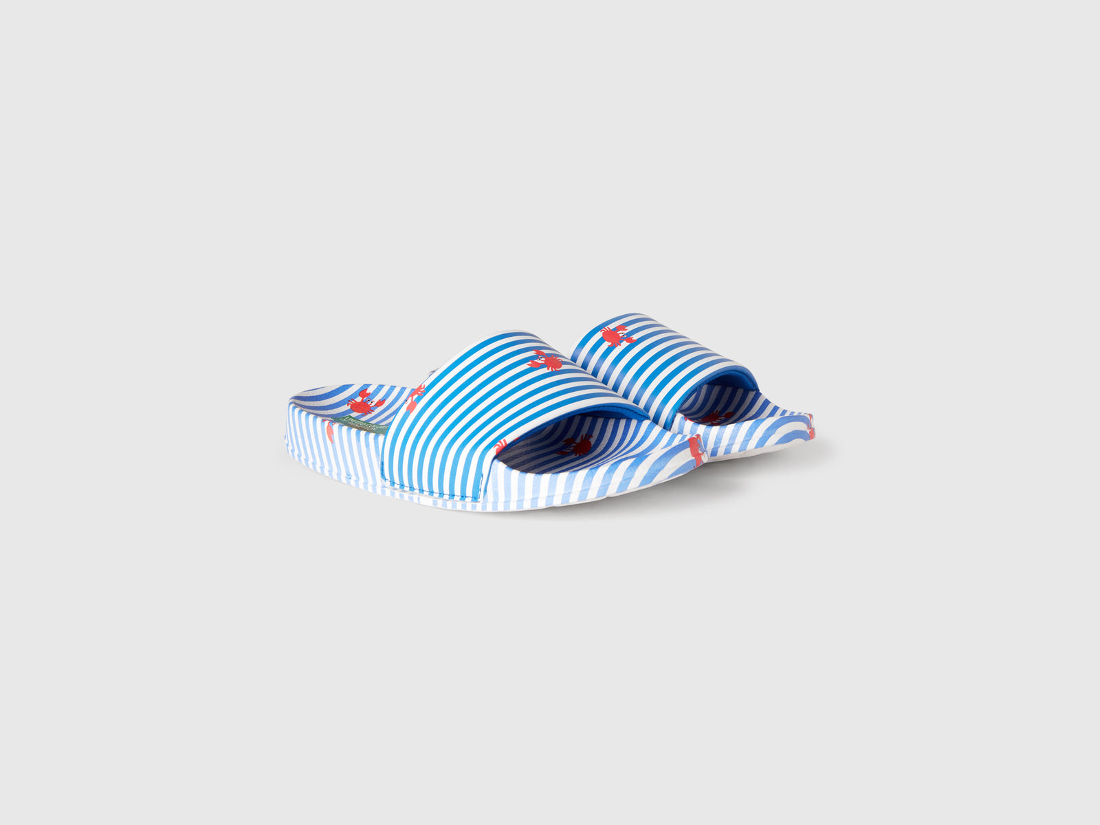 Ciabatte a righe da bambino blu 3 | Benetton Outlet