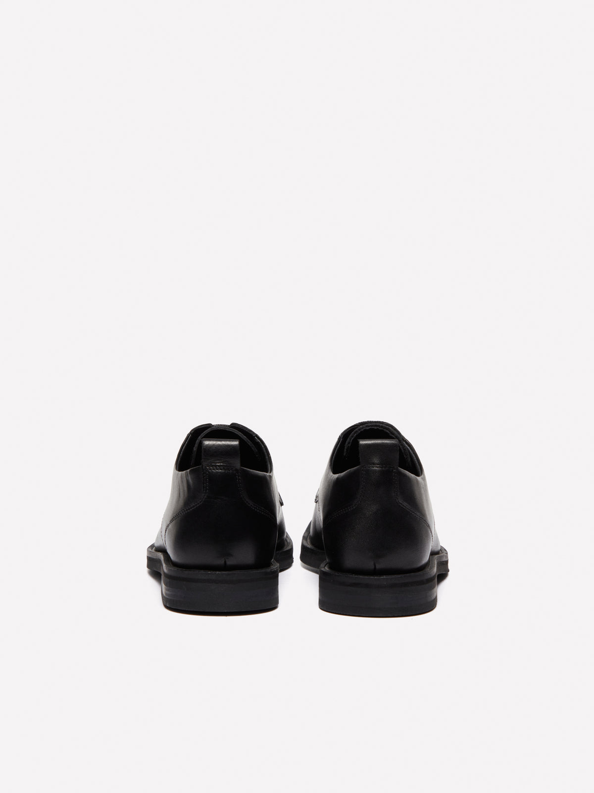 Scarpe in pelle con borchiette