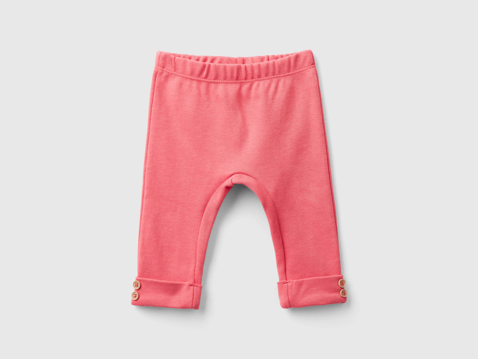 Leggings in cotone bio da neonato salmone | Benetton Outlet