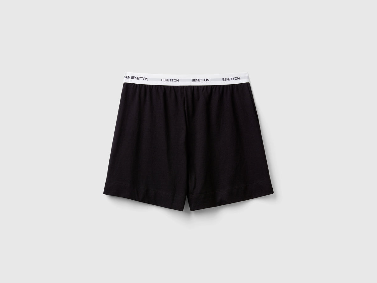 Shorts con elastico logato