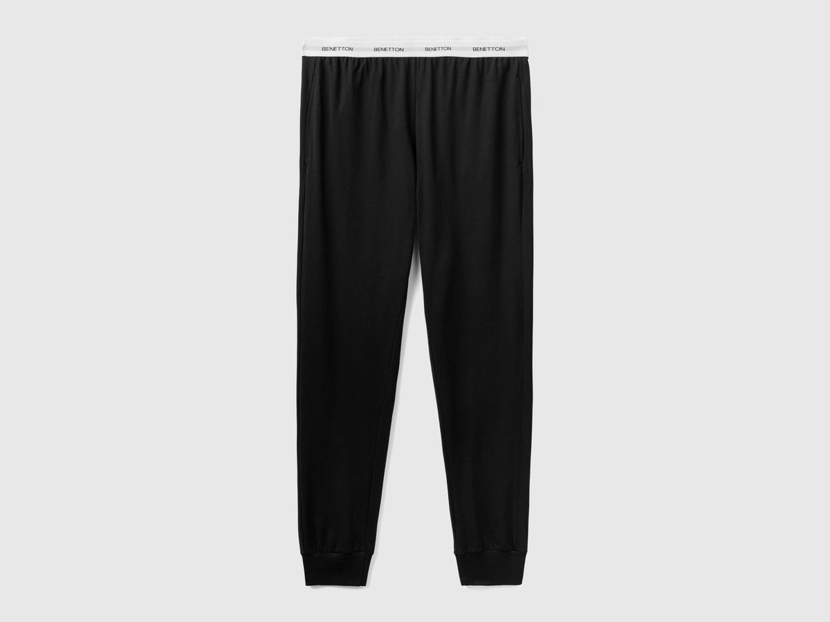 Pantaloni con elastico logato
