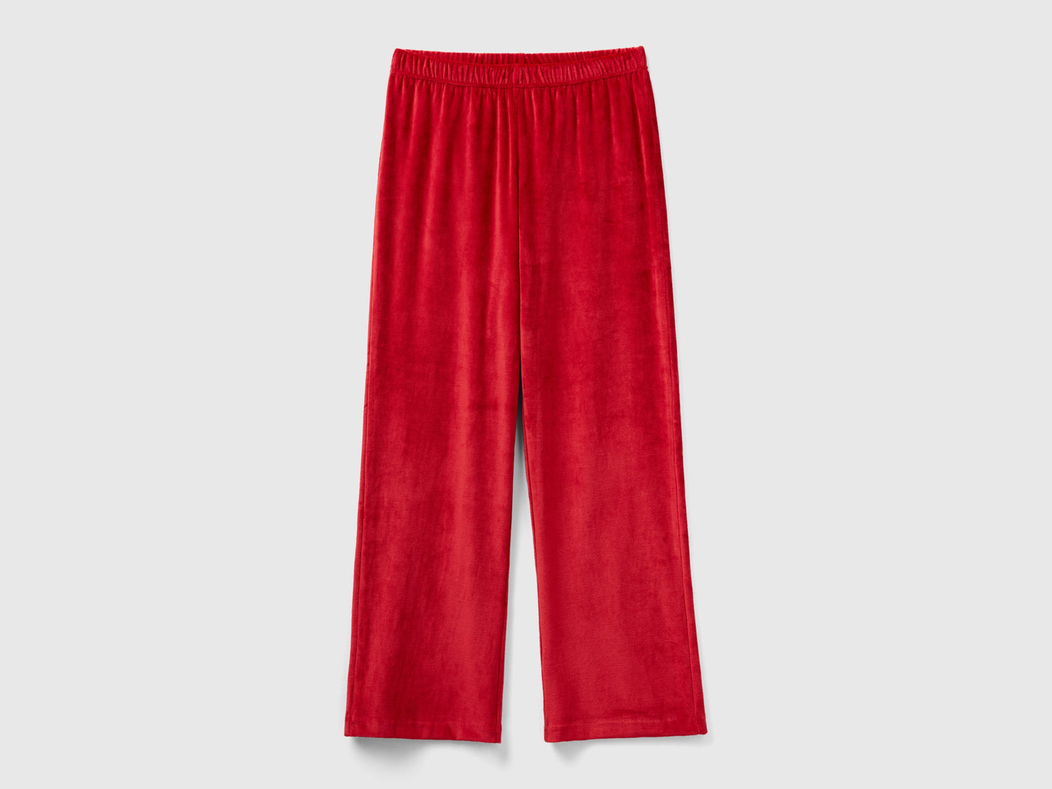 Pantaloni palazzo in velour da donna rosso | Benetton Outlet