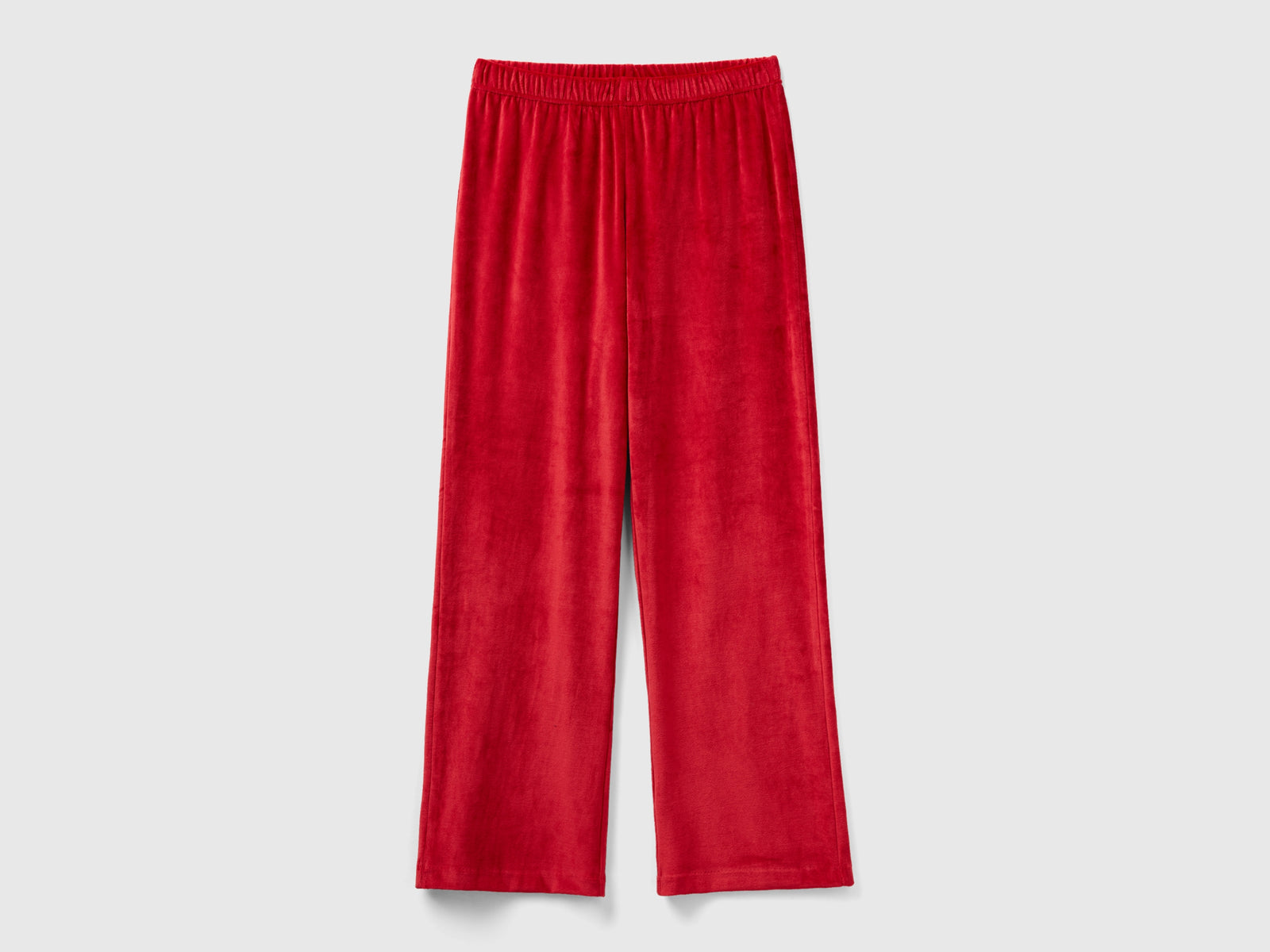 Pantaloni palazzo in velour da donna rosso | Benetton Outlet