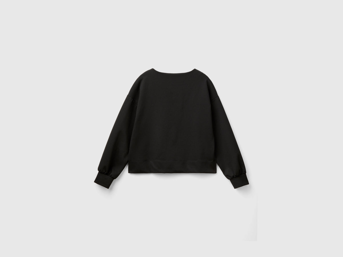 Maglia fluida con scollo a barchetta