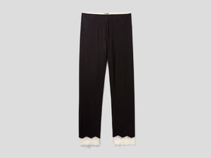 Pantaloni con dettagli in pizzo