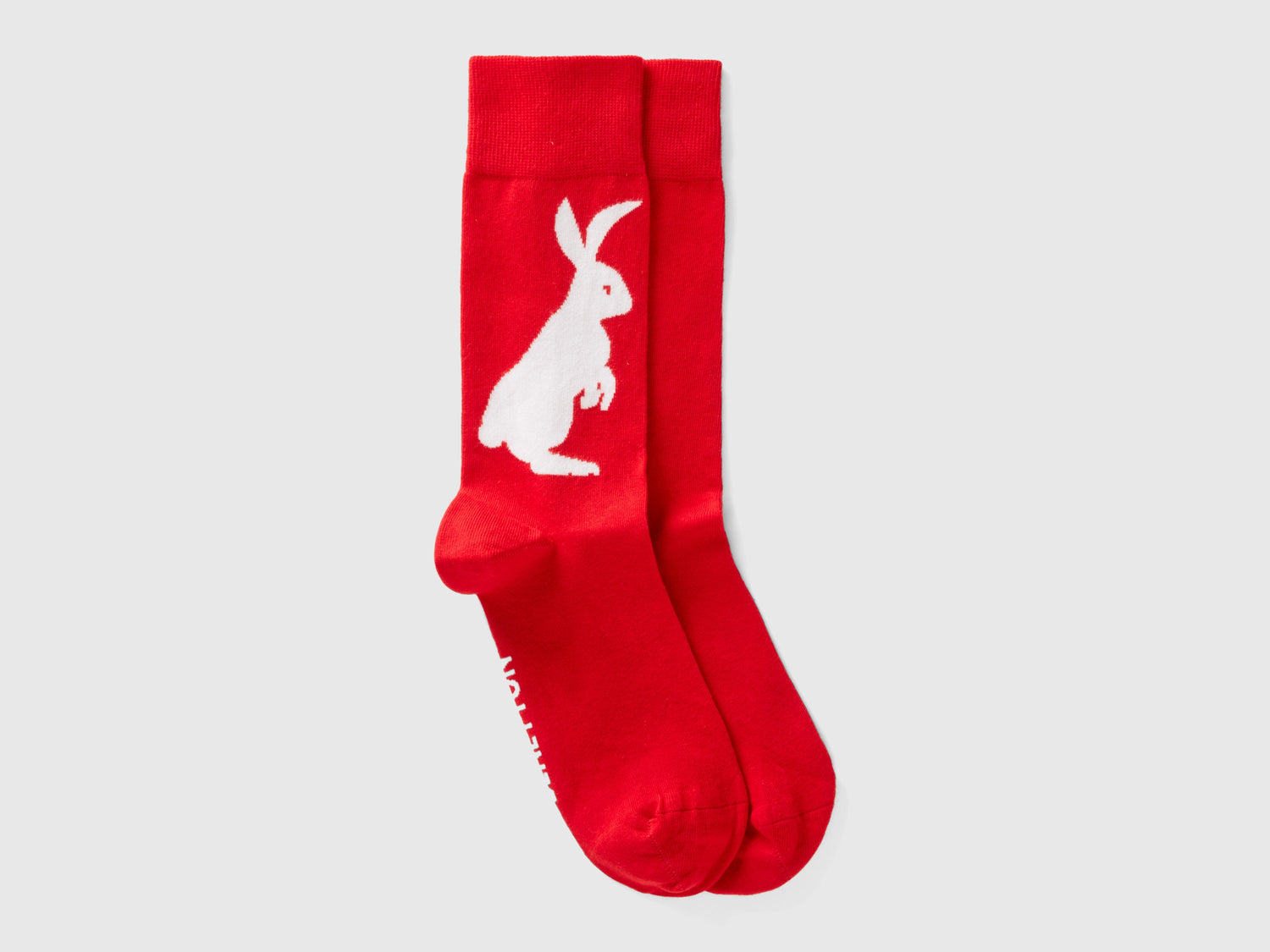Calcetines largos rojos con diseño de conejo. da uomo rosso | Benetton Outlet