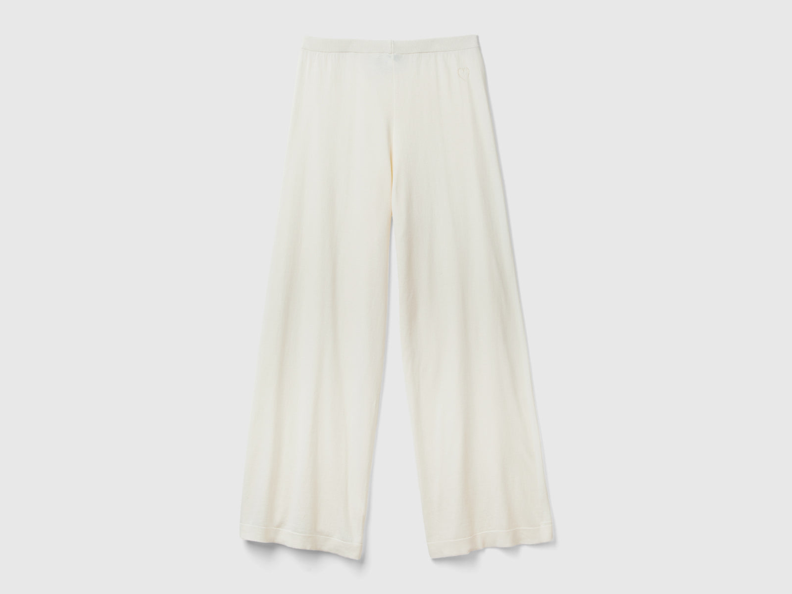Pantaloni in maglia da donna bianco panna | Benetton Outlet