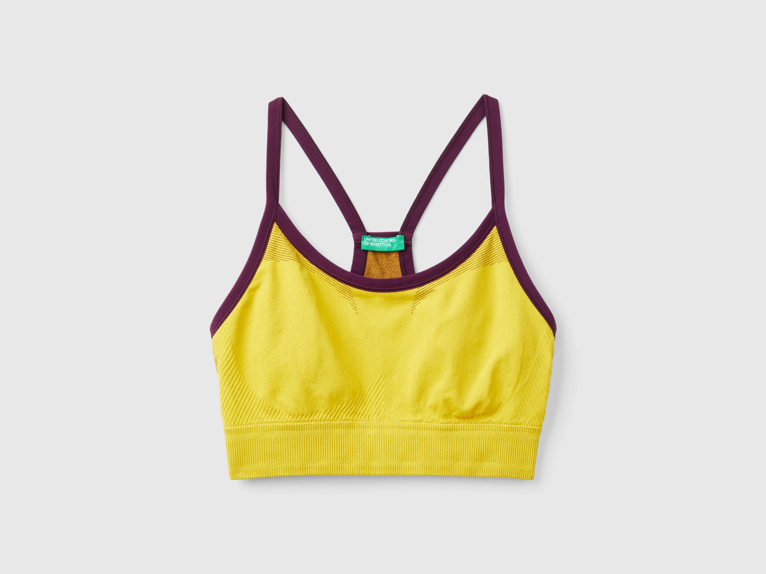 Top bra sportivo senza cuciture da donna giallo | Benetton Outlet