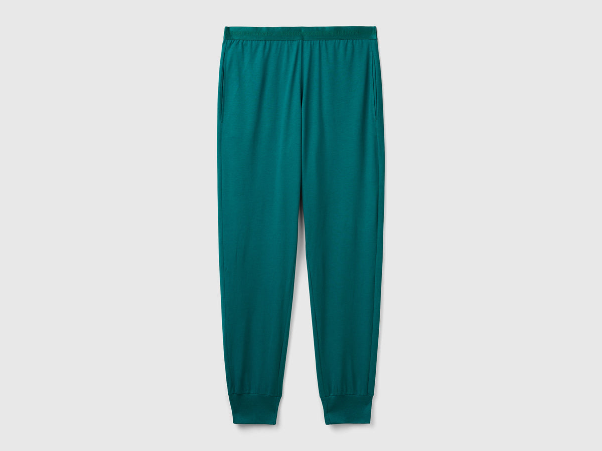 Pantaloni con elastico logato