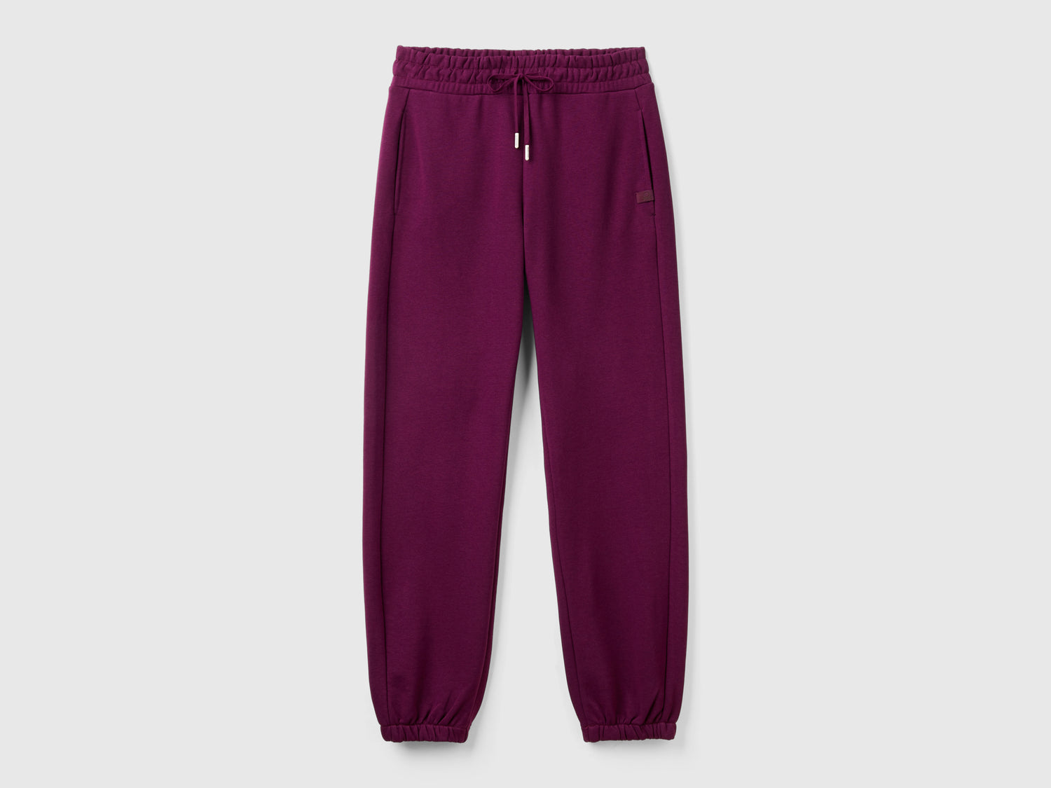 Pantaloni in felpa con coulisse da donna malva scuro | Benetton Outlet