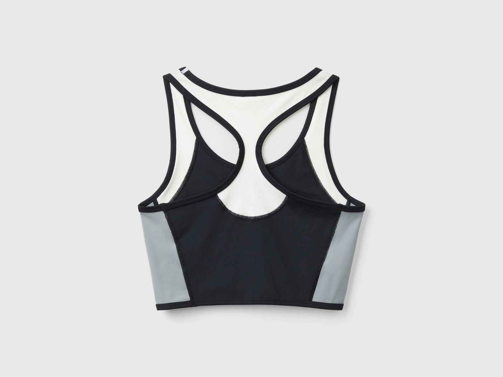 Top bra sportivo con tessuto riciclato da donna nero 2 | Benetton Outlet