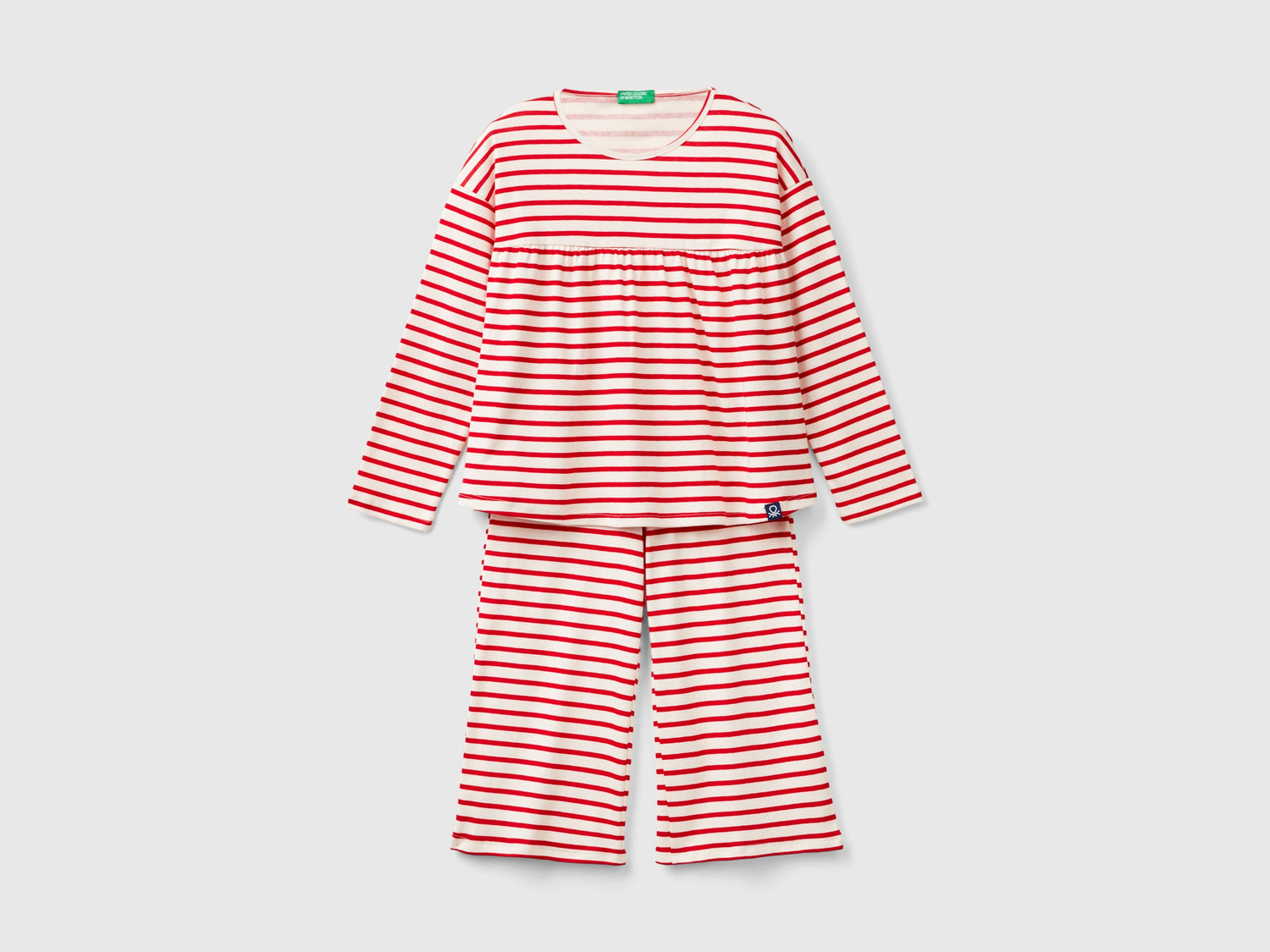 Pigiama ampio a righe in cotone bio da bambina rosso | Benetton Outlet