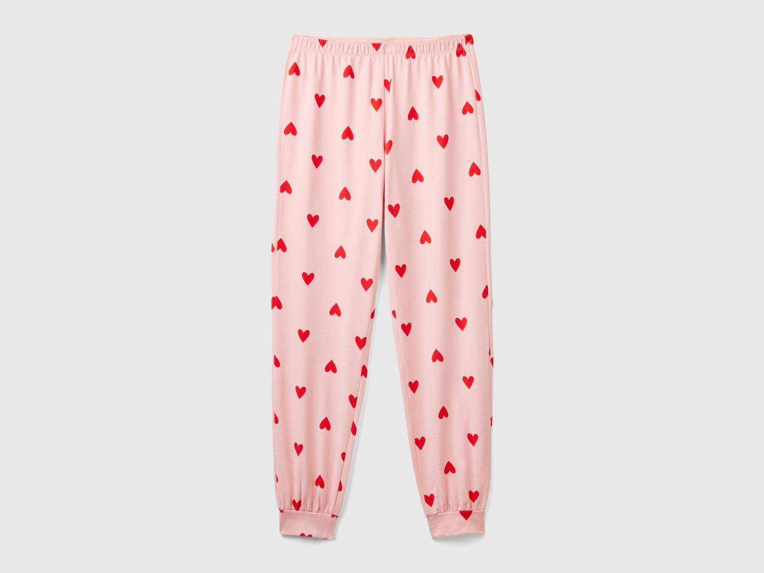 Pantaloni in caldo cotone con cuori da donna rosa | Benetton Outlet