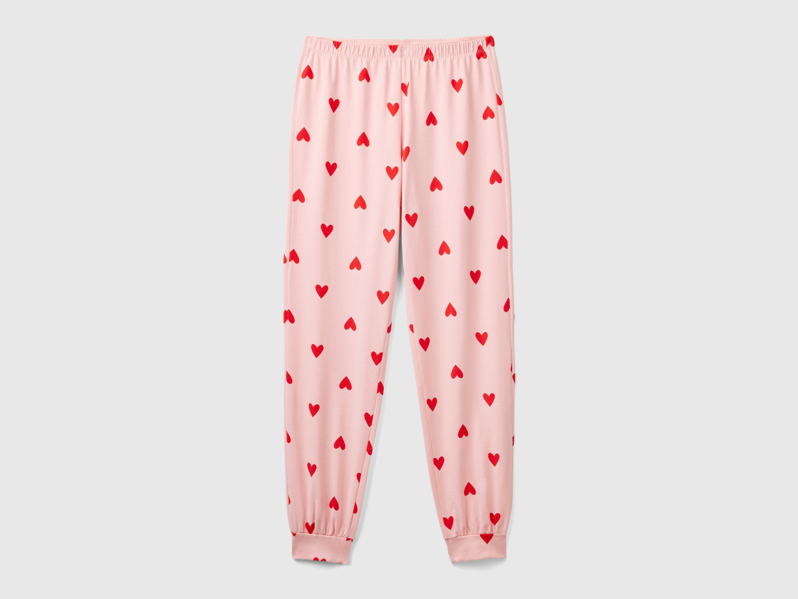 Pantaloni in caldo cotone con cuori da donna rosa | Benetton Outlet