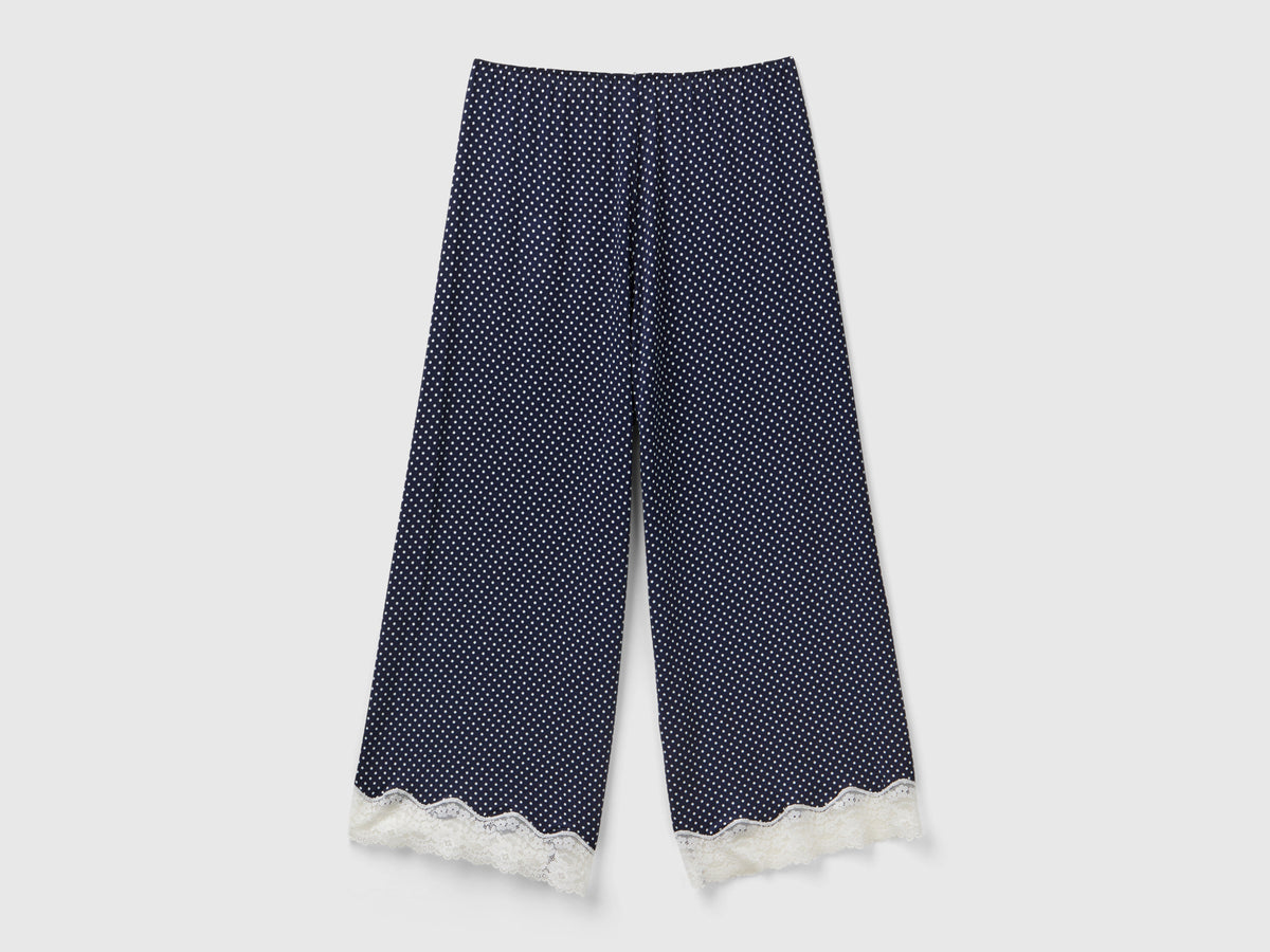 Pantaloni a pois con dettagli in pizzo