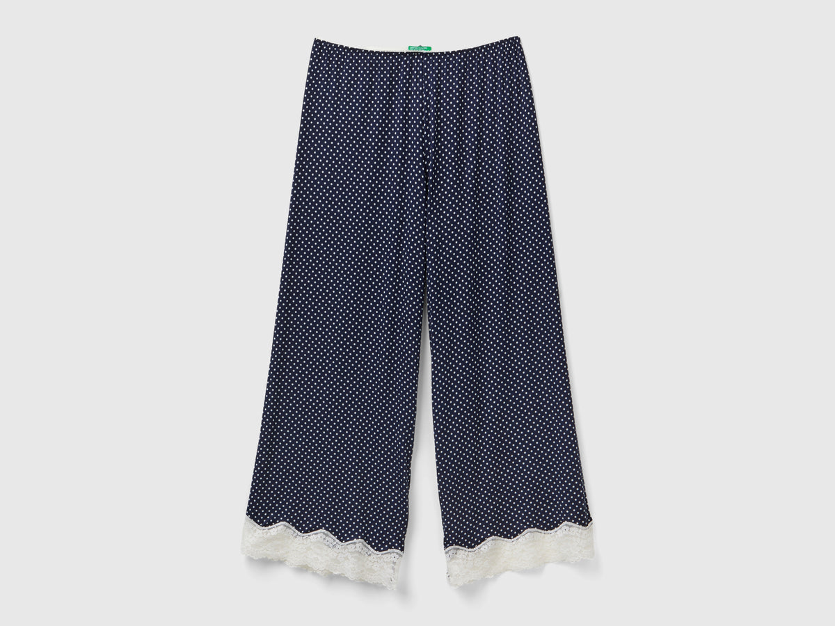Pantaloni a pois con dettagli in pizzo