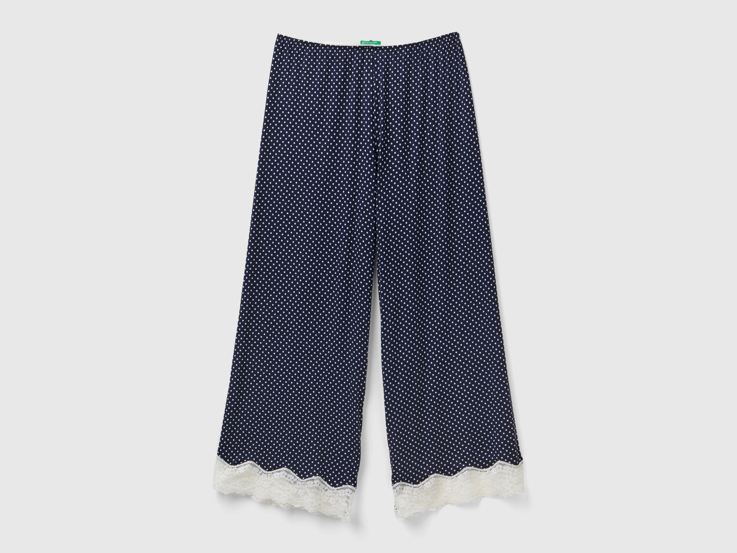 Pantaloni a pois con dettagli in pizzo da donna blu | Benetton Outlet