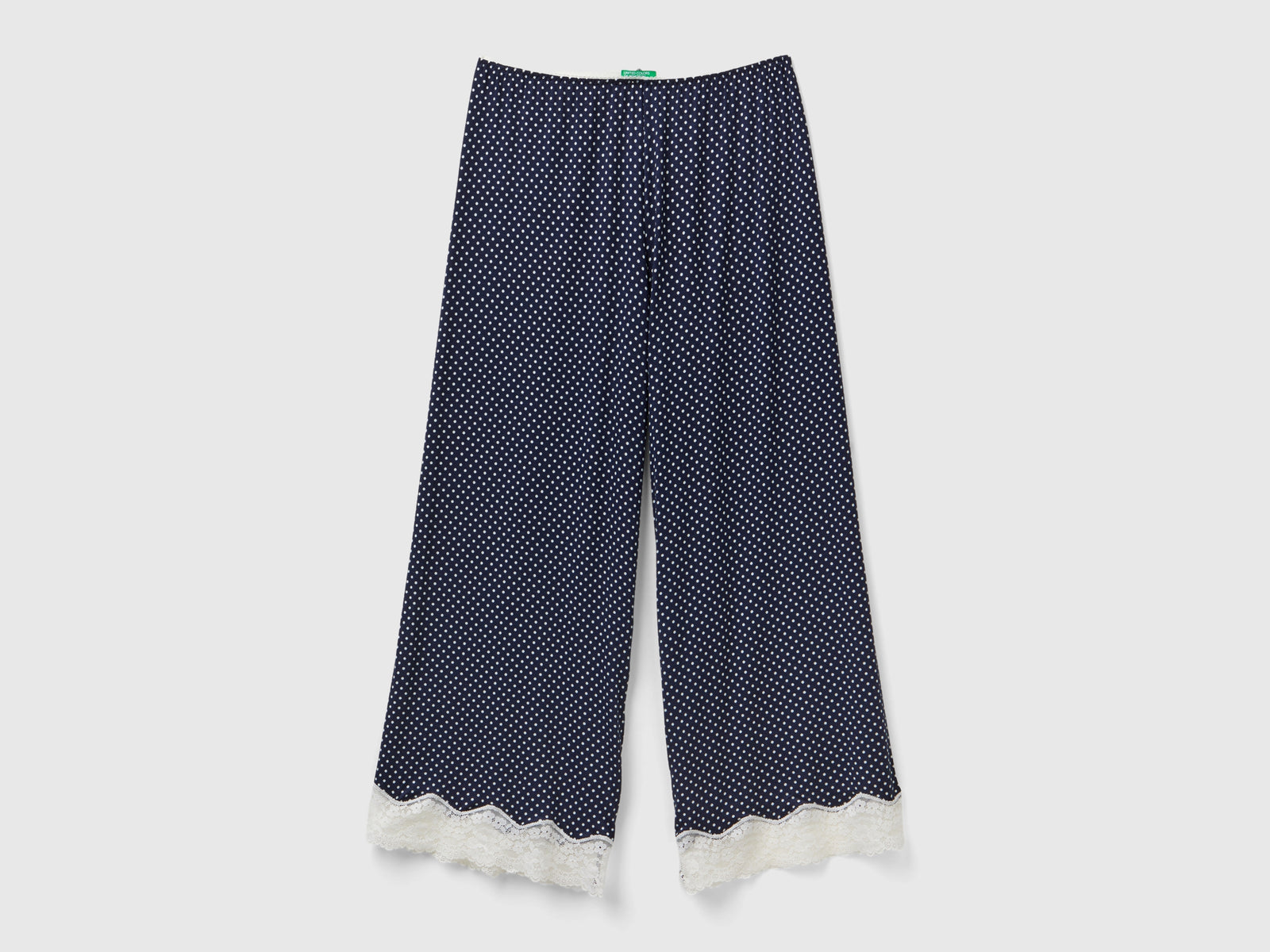 Pantaloni a pois con dettagli in pizzo da donna blu | Benetton Outlet