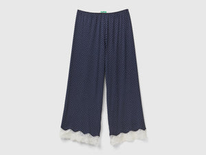 Pantaloni a pois con dettagli in pizzo