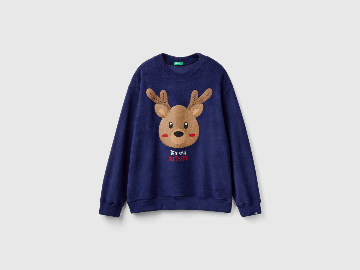 Suéter de polar con estampado de renos