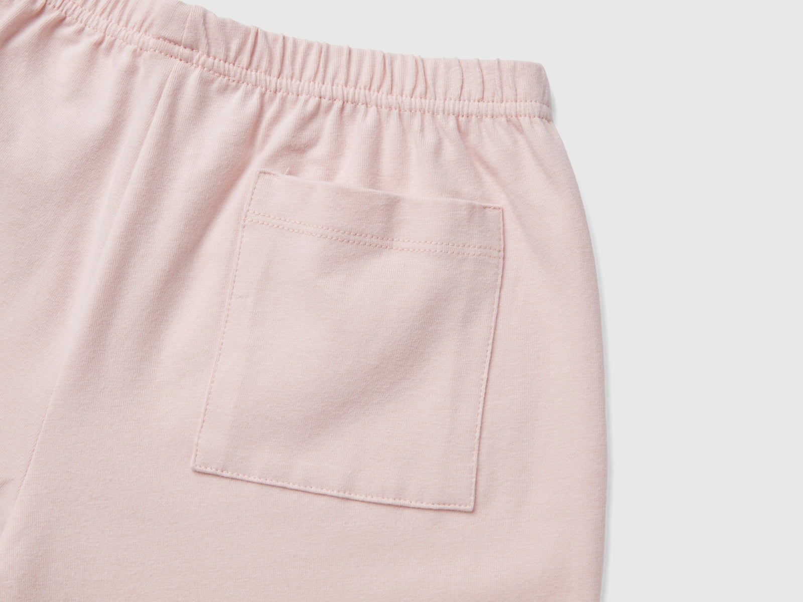 Pigiama in cotone stretch da bambino rosa tenue 3 | Benetton Outlet