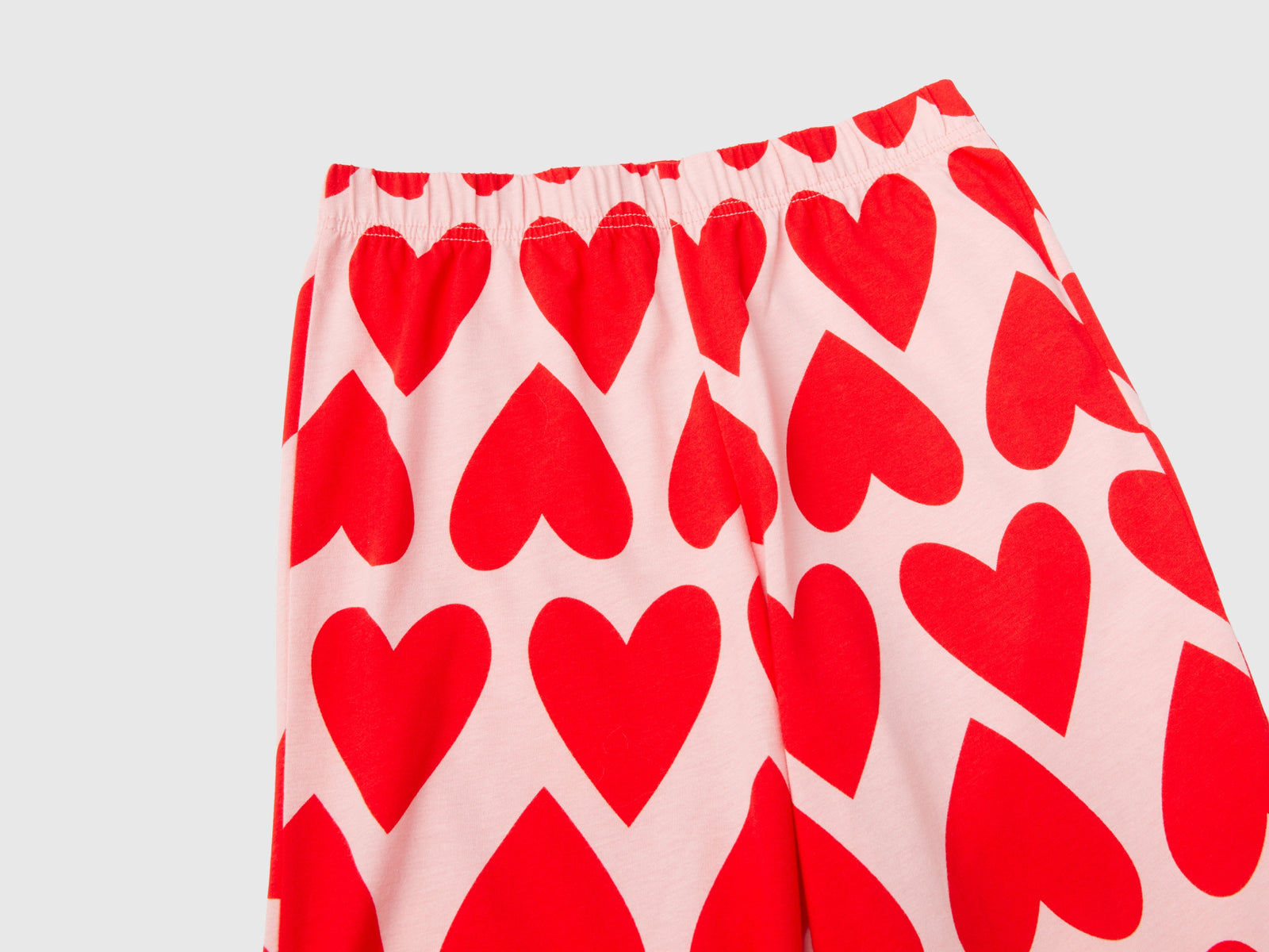 Pigiama con stampa cuori da bambino rosa 3 | Benetton Outlet