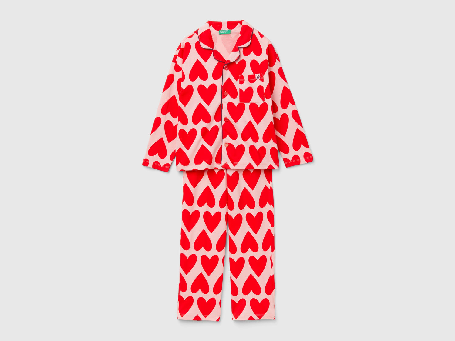 Pigiama con stampa cuori da bambino rosa | Benetton Outlet