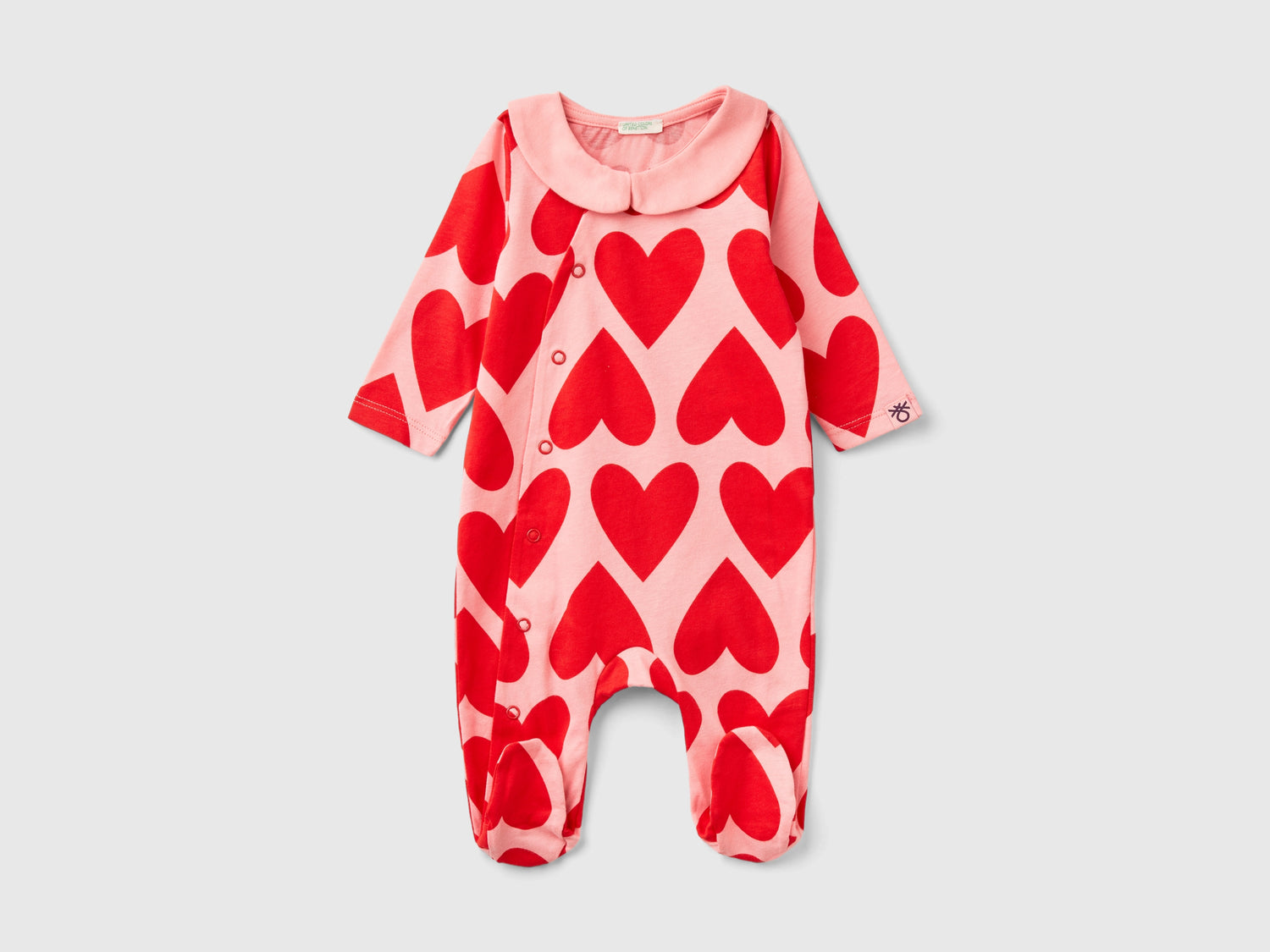 Long romper with heart print da neonato rosa | Benetton Outlet